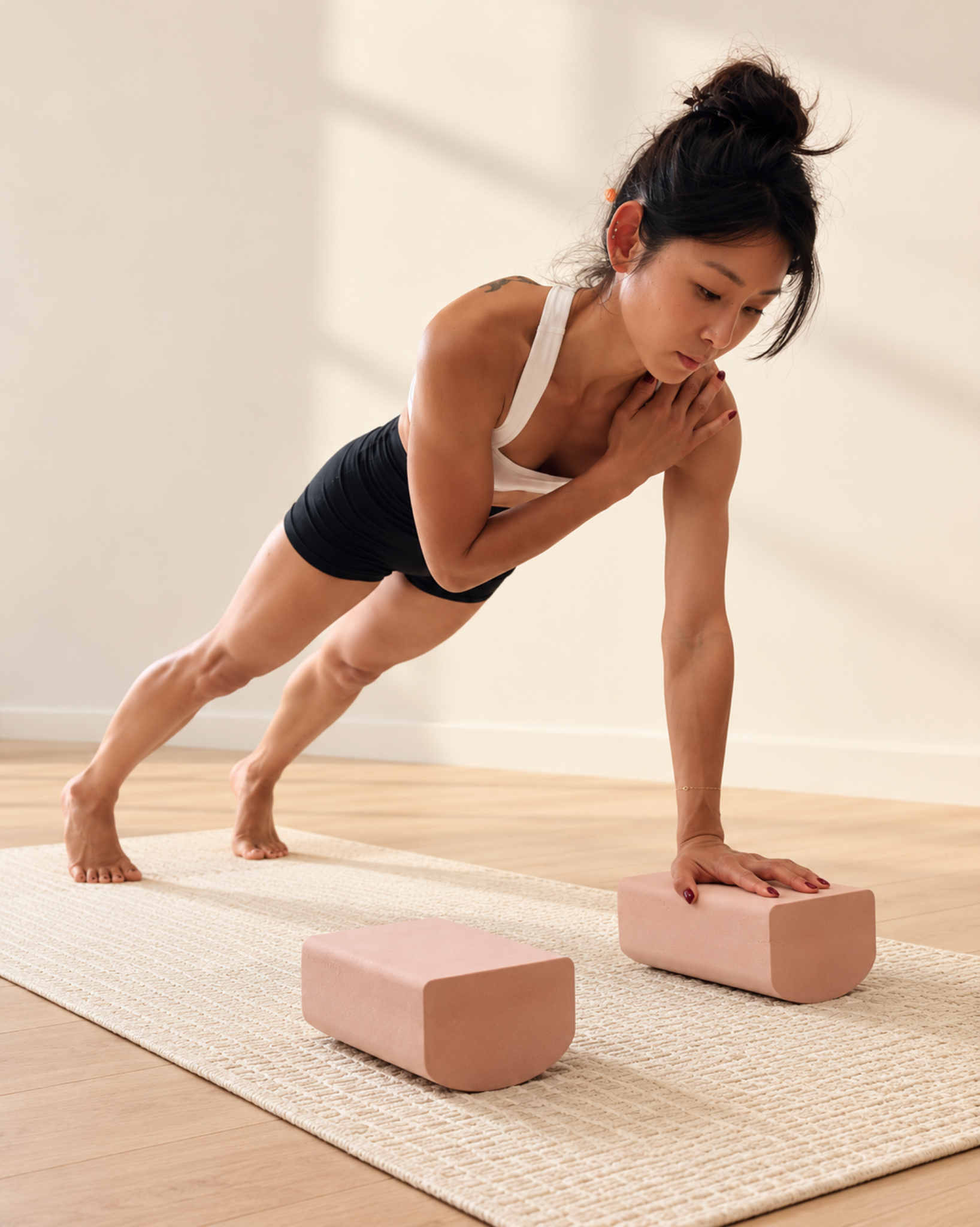 Side plank twist with one hand on the Posture Block